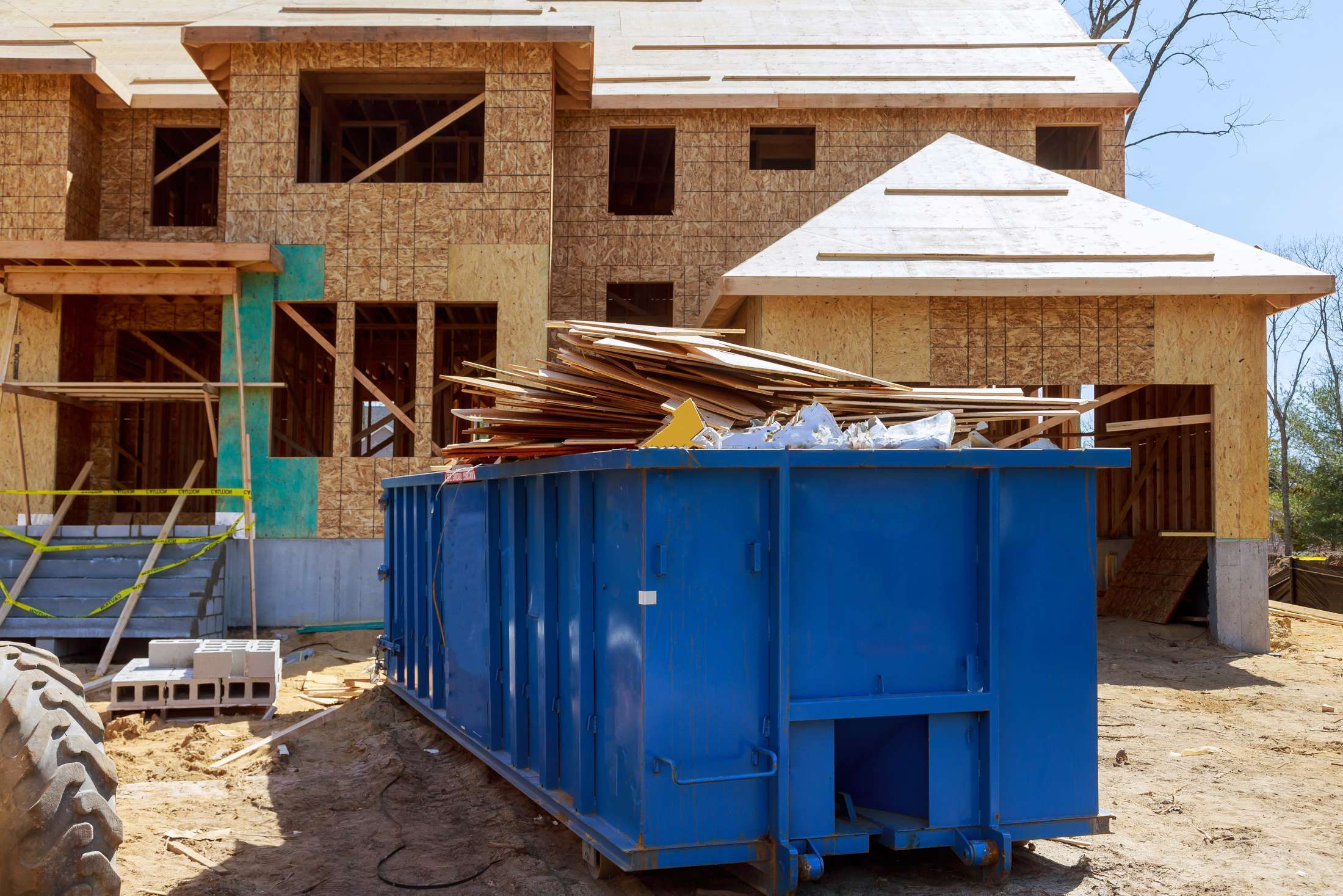 Contractor Dumpster Rental Outside New Home Construction